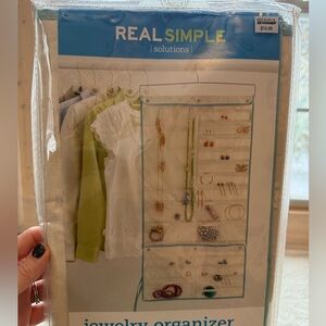Real Simple Jewelry Organizer with 70 clear pockets!!